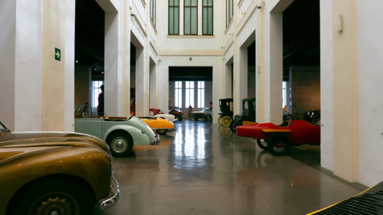 Photography - A pile of vintage cars in "Museo Automovilistico y de la Moda" in Málaga, Spain